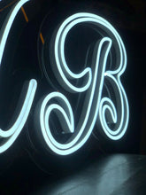 double writing initials neon